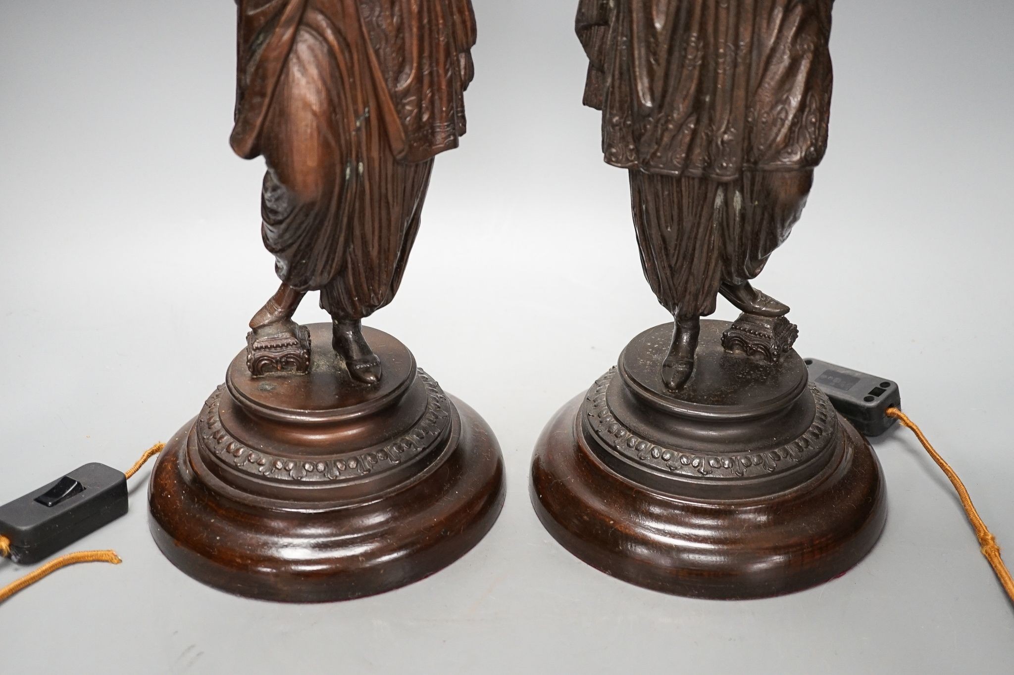 A pair of spelter figural table lamps, 50cm